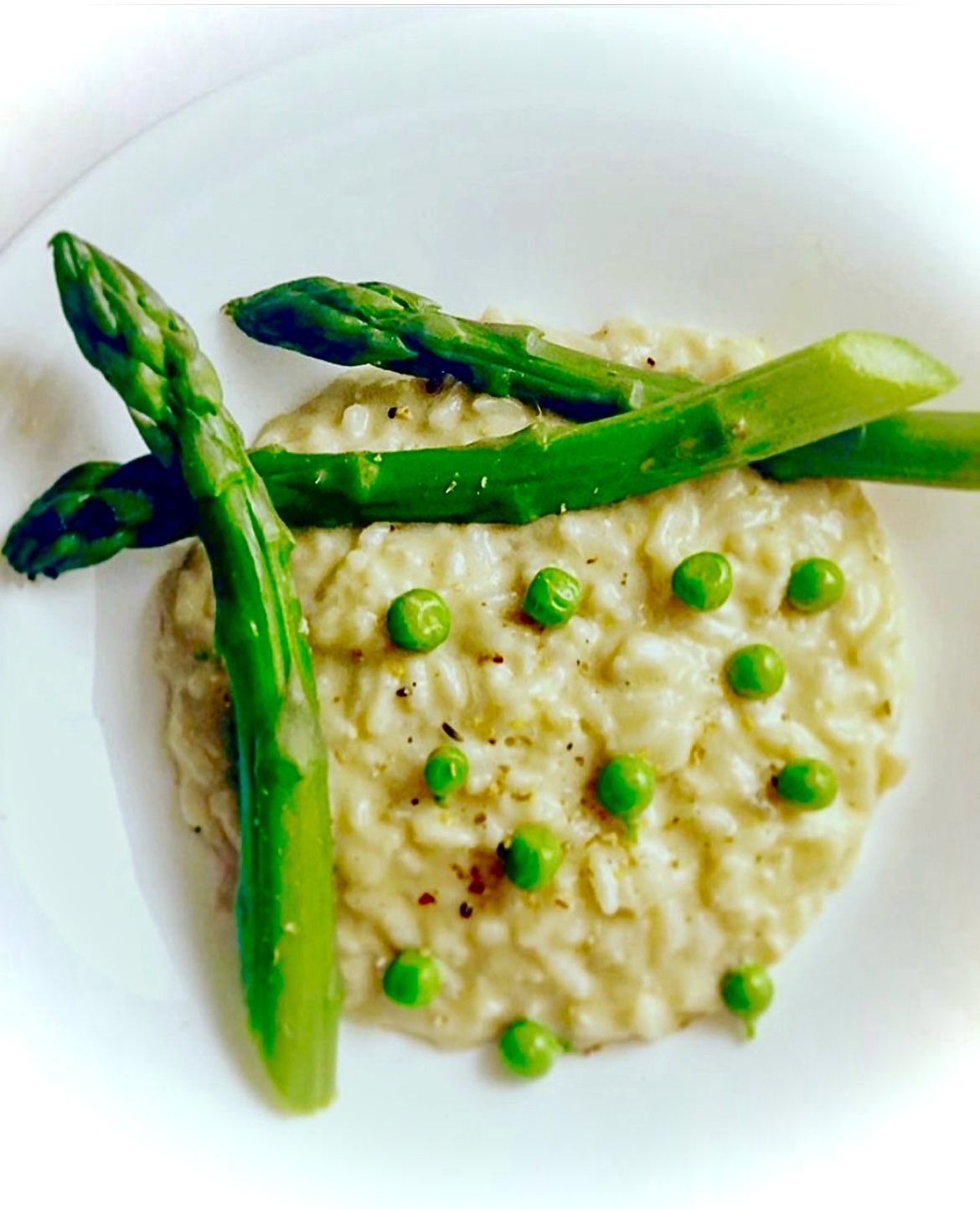 Risotto crémeux aux petits pois et asperges grillées